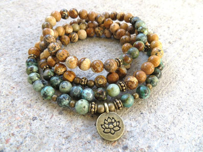 african turquoise and picture jasper finished with a lotus charm - convertible to necklace and bracelet in 108 mala bead count