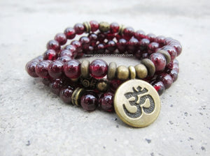 108 mala convertible to necklace or bracelet in red wine garnet, finished with an OM charm