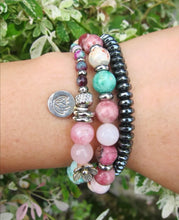 Female Goddess Mala Bracelet - The 27 Bead count features natural pink opal, pink rhodonite, pink chalcedony, norwegian thulite, red hematoid quartz, peruvian turquoise, amazonite - finished with a stainless steel Lotus Charm, and a lotus guru bead. 